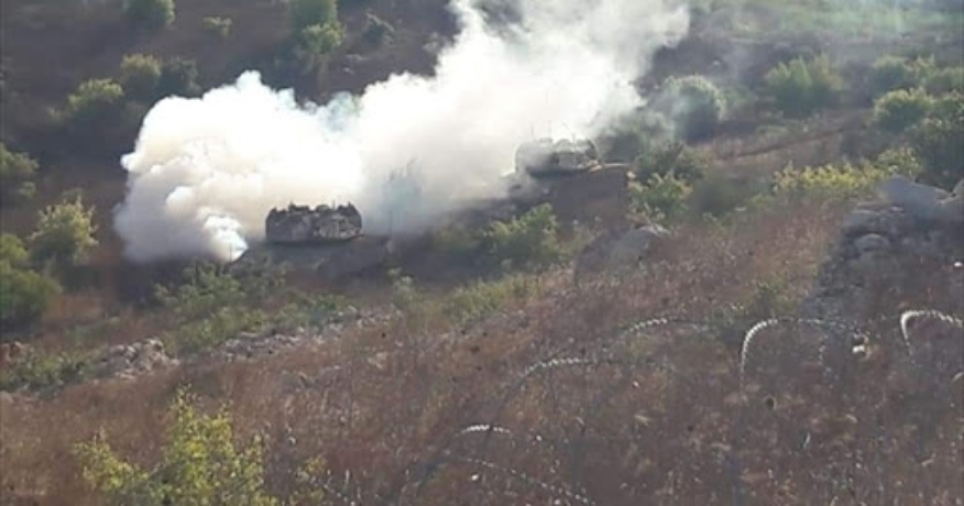 إنسحاب  الدبابتين &quot;الإسرائيليتين&quot; تحت غطاء من القذائق الدخانية التي تتسبب بحريق امتد إلى الأراضي المحتلة
