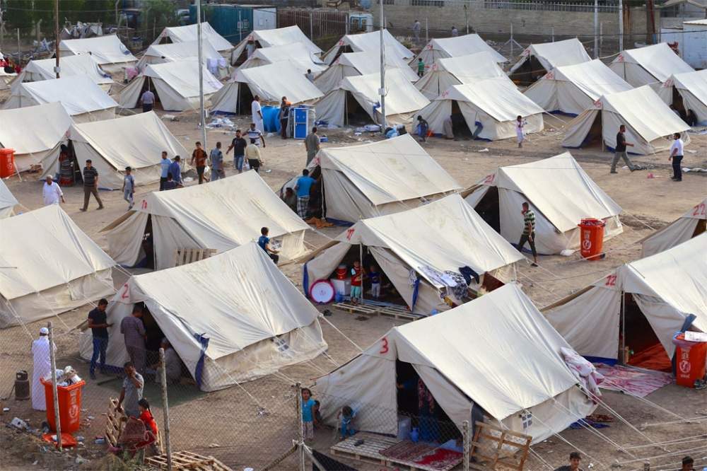 14 شهيداً و 13 جريحاً بتفجير انتحاري في مخيم للنازحين العراقيين بالأنبار