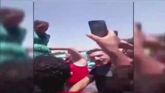 بالفيديو.. ضربوها وعلقوها على عامود إنارة في مصر
