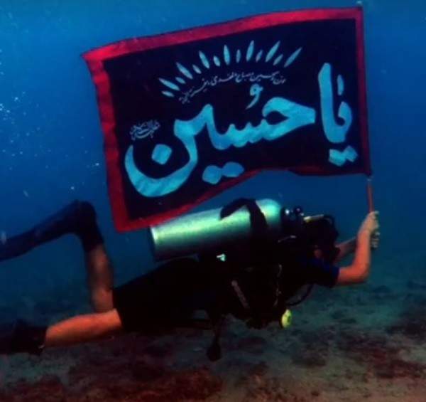 بالفيديو: على عمق 25 متراً.. راية الحسين في قاع بحر صور