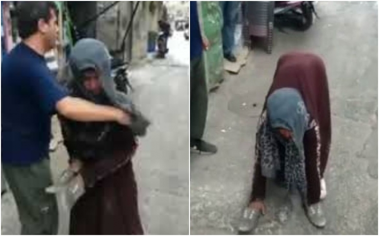 ​بالفيديو/ شاب يتنكر بزي امراة متسولة تمشي على يديها وقدميها في برج البراجنة