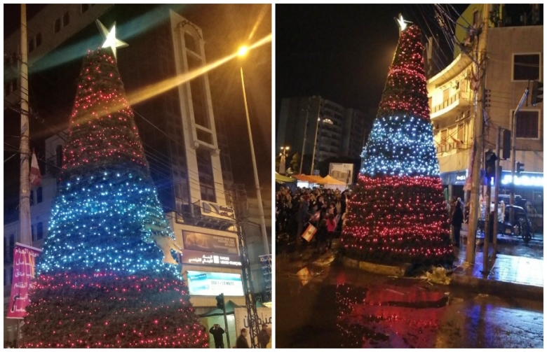 بالصور/ إضاءة شجرة الميلاد في ساحة النور في طرابلس على شكل العلم اللبناني