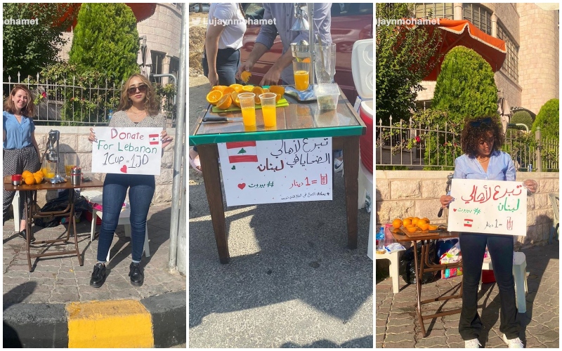 مجموعة من الشباب الأردنيين يبيعون عصير برتقال لجمع المساعدات لأطفال وأهالي الضحايا في لبنان
